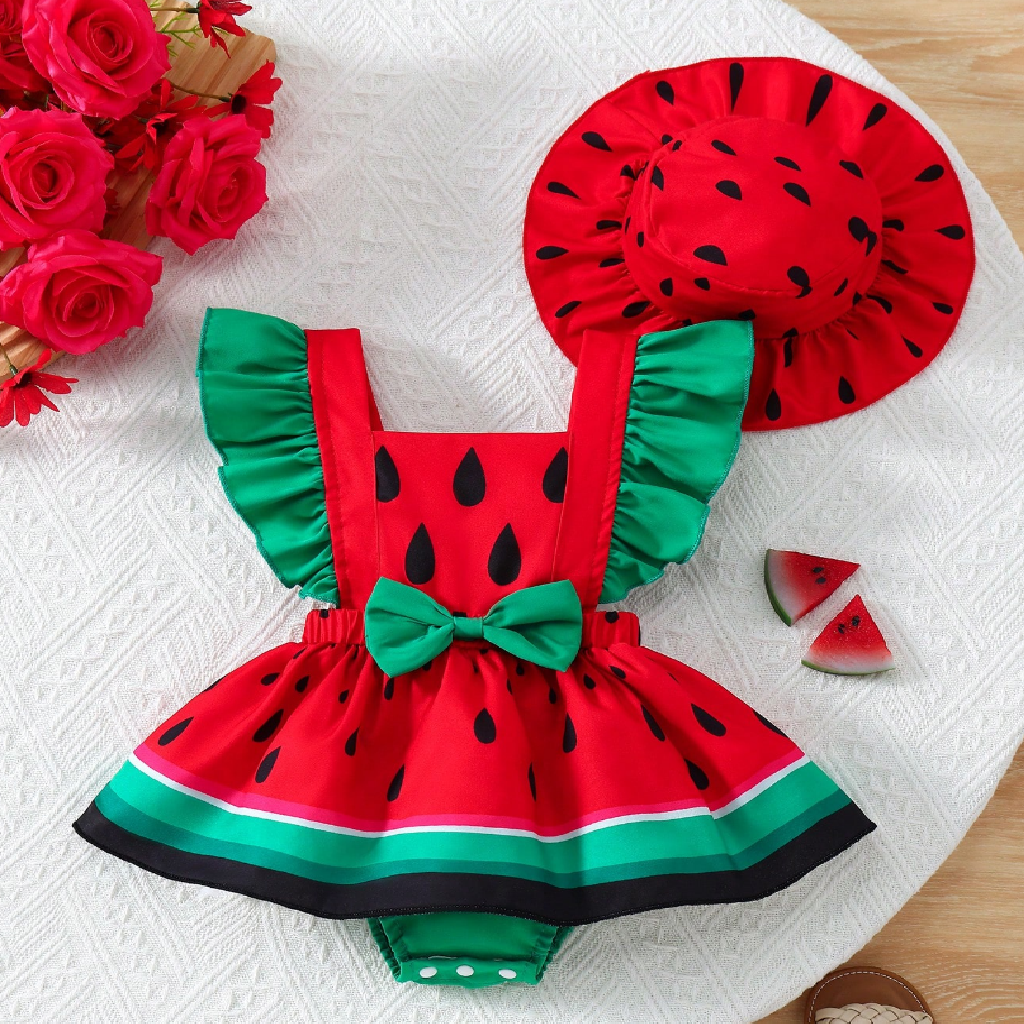 Watermelon-themed children's outfit with dress and hat on a white textured surface.
