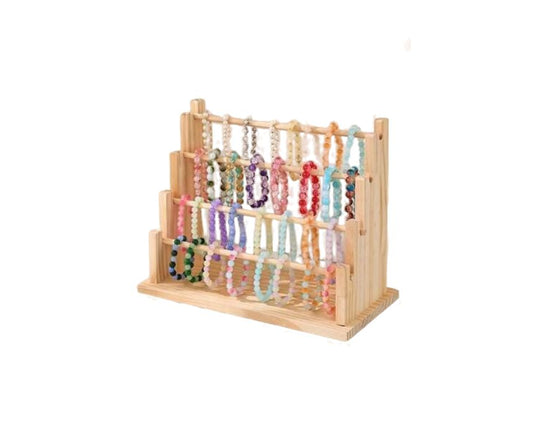 Wooden bracelet display rack with colorful bracelets 