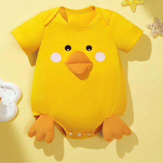 Yellow baby onesie with a chick design on a yellow background