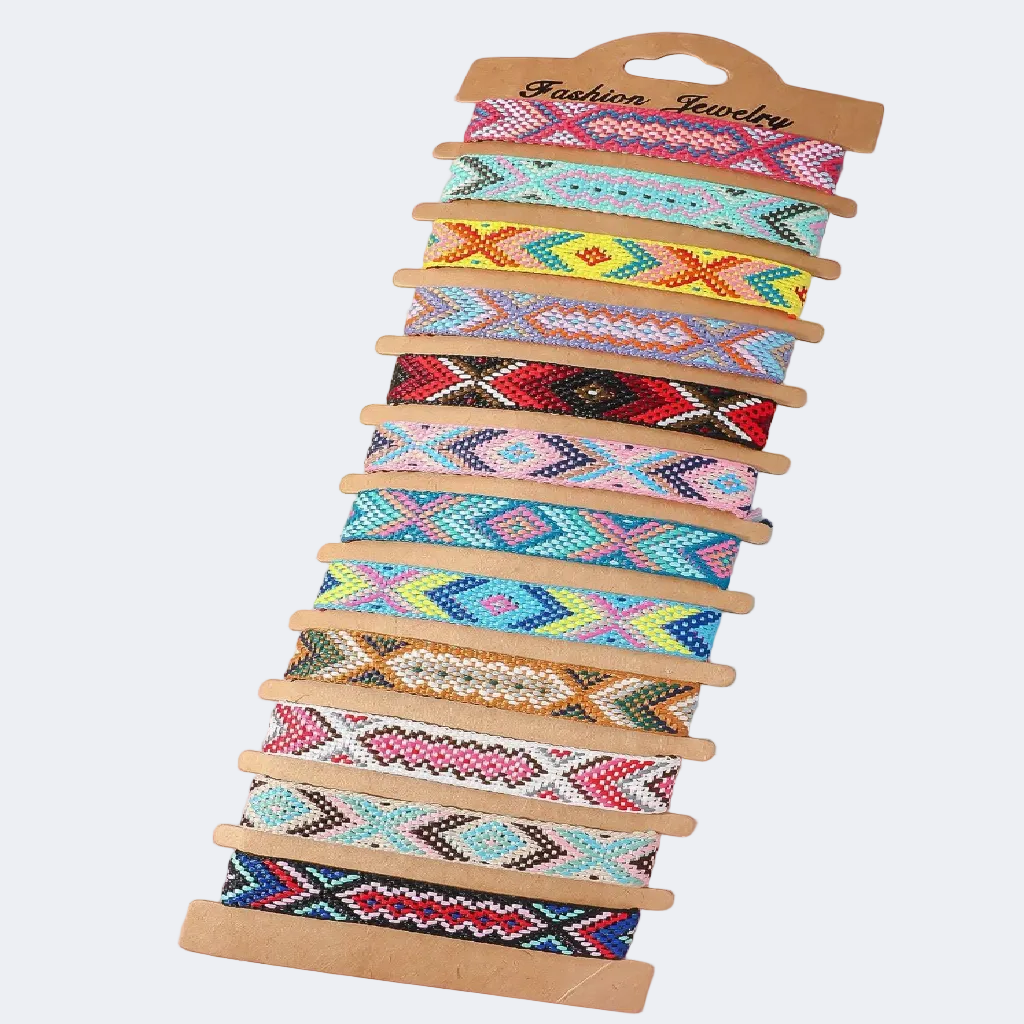 Set of colorful beaded bracelets on a wooden display card against a pastel background