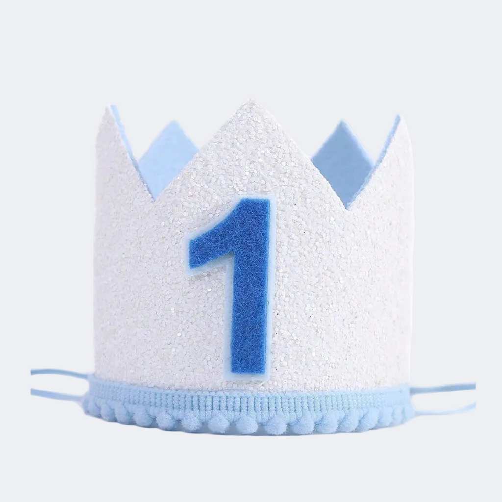 White birthday crown with blue number '1' on a white background