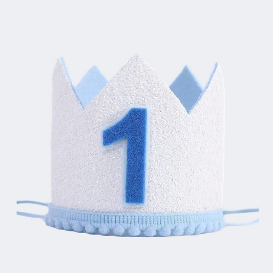 White birthday crown with blue number '1' on a white background