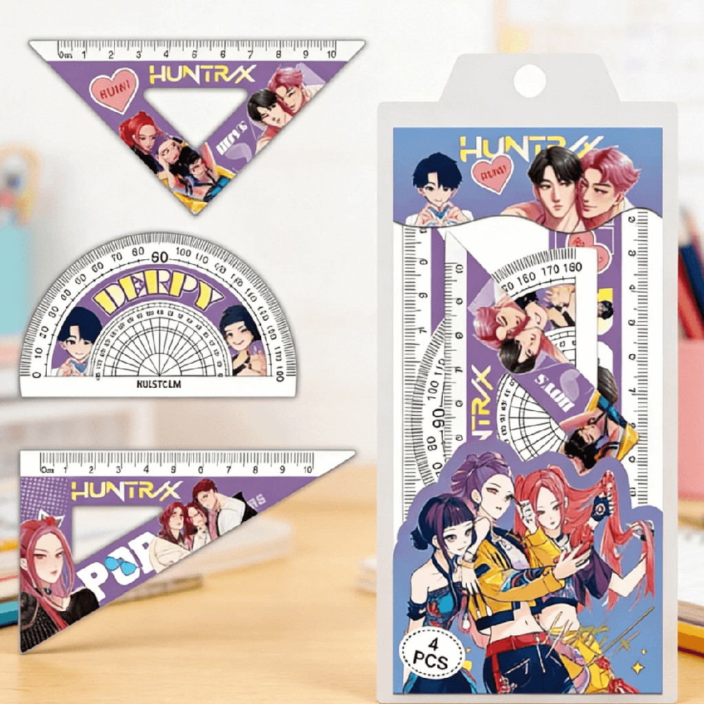 Set of stationery items with character design on a wooden surface