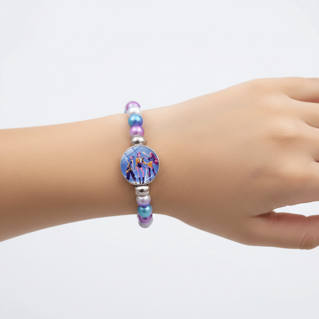 Multicolored beaded bracelet with a circular charm featuring characters on a white background
