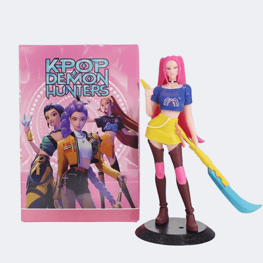 Action figure with pink hair and a colorful outfit next to its packaging titled 'KPOP Demon Hunters'.