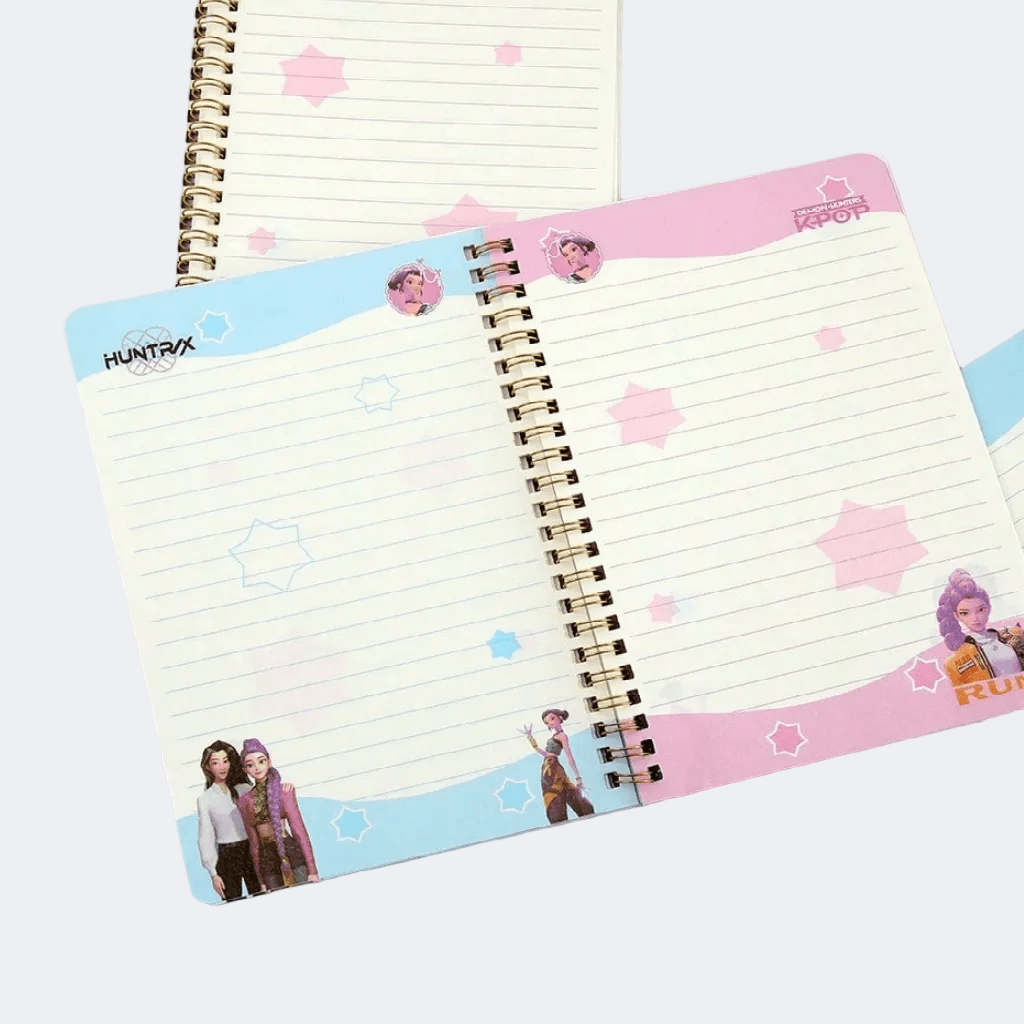 Notebook with colorful design and character illustrations on a white background