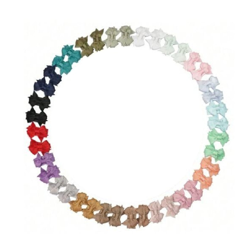 Color swatch of various butterfly-shaped hair clips in a circular arrangement on a white background.