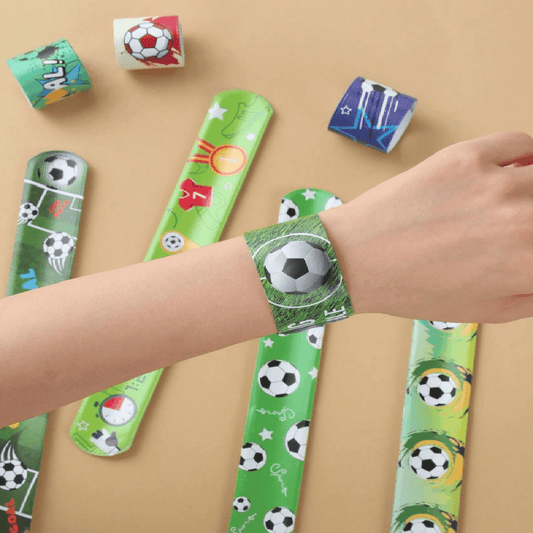 Collection of colorful slap bracelets with sports-themed designs on a white background